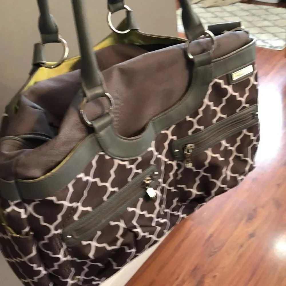 JJ Cole Gray and white Quattro foil diaper bag.